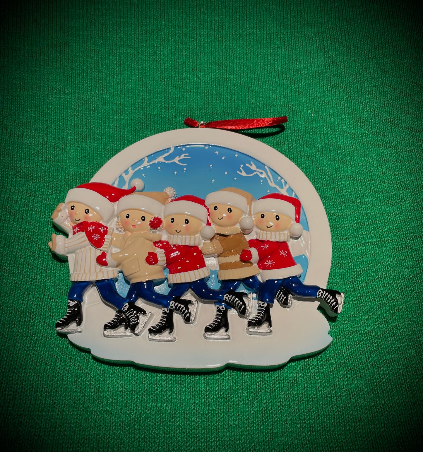 Adorno Navideño Familia Patinando (5)